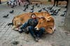 âCow and boy rest together near Durbar Square,â Kathmandu, Nepal, 2013.