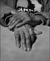 âMarilyn Moore, UAW Local 1112, Womenâs Committee and Retiree Executive Board, with her General Motors company retirement gold ring on her index finger, Youngstown, Ohio, 2019â by LaToya Ruby Frazier. Gelatin silver print, 60 x 48 inches.